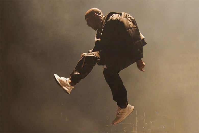 https___hypebeast.com_image_2015_05_kanye-west-rocks-the-new-adidas-ultra-boost-triple-white-during-bbma-performance-1
